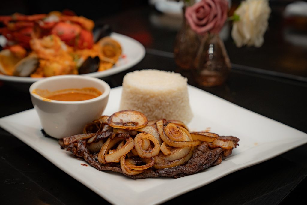 Latin dinner plate at Don Rene Restaurant and Lounge in White Plains NY featuring signature dinner dishes and handcrafted sides