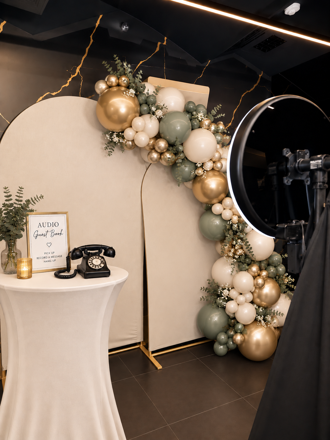 Photo booth, audio guest book and balloon décor setup by SobyCam Event Services